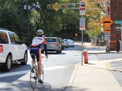 Cyclist riding on street