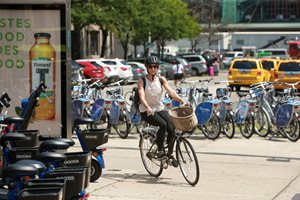 cyclist near parked bikes in Hoboken